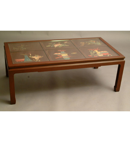 Cocktail table constructed from early 19th century Chinese brown lacquer panels, now in a Chinese style glass-topped table base.