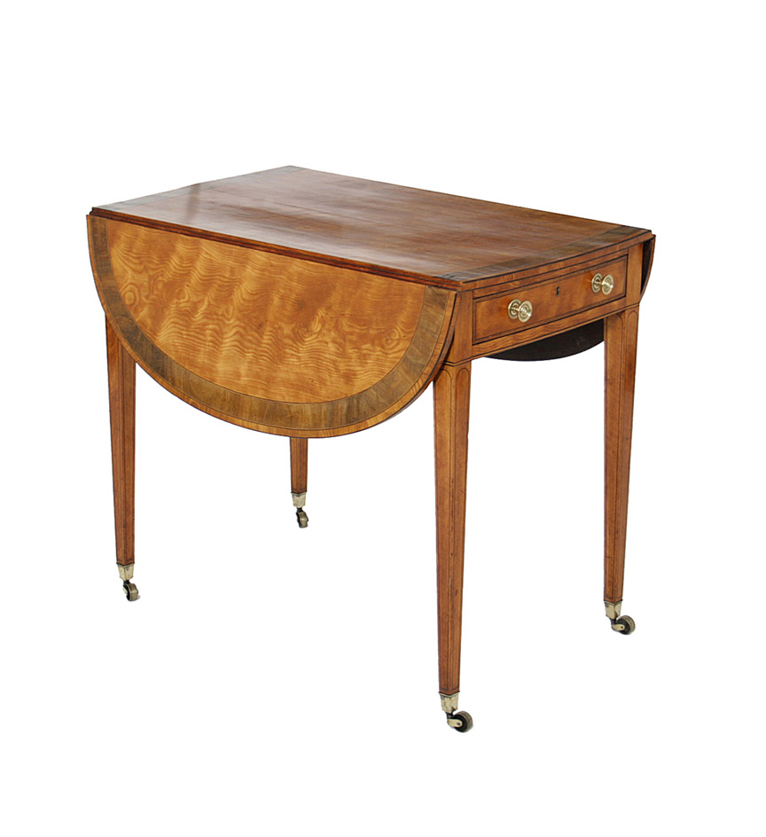 A George III  satinwood pembroke table with D-form drop leaves, the top with wide yewwood banding, raised on tapering legs ending in casters.