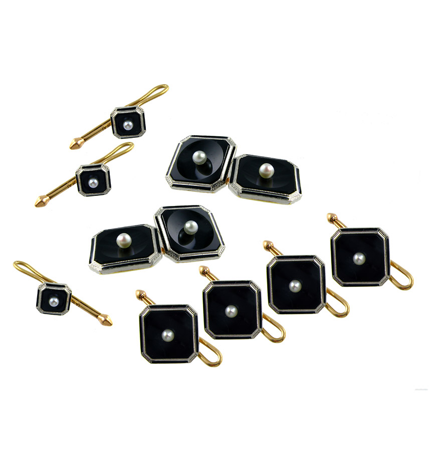 An Art Deco onyx,seed pearl  and enamel full gentleman's dress set, with chased platinum  borders, in 14k. Krementz.