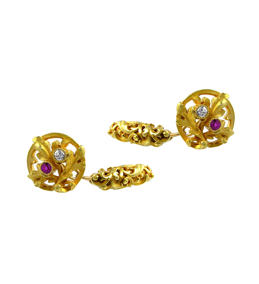 A pair of Art Nouveau gold floral cufflinks, with rubies and diamonds, in 18k. France.