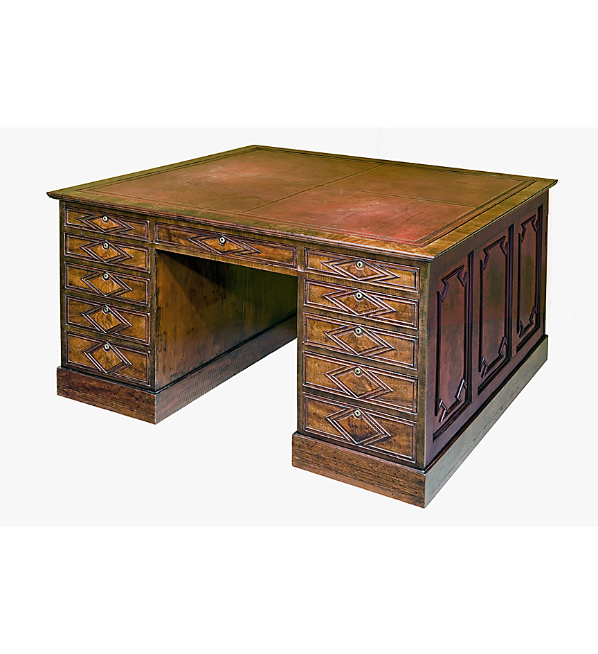 A 19th c. mahogany partner's desk with inset leather top.