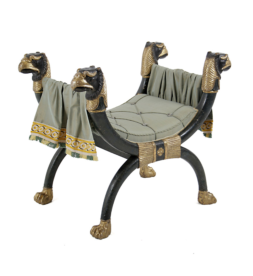 Fine Regency giltwood and painted upholstered X-frame stool with griffin head monopodia supports, bundled reed clasp and paw feet, based on a design by Thomas Hope.   This stool is based on the design in Thomas Hope's 'Household Furniture and Interior Decoration' plate 12 no.4. See illustration. For a similar example with lions head monopodia see 'The History of English Furniture' by Percy MacQuoid, The Age of Satinwood, Putnam's Sons, New York, 1908; figure 237 .