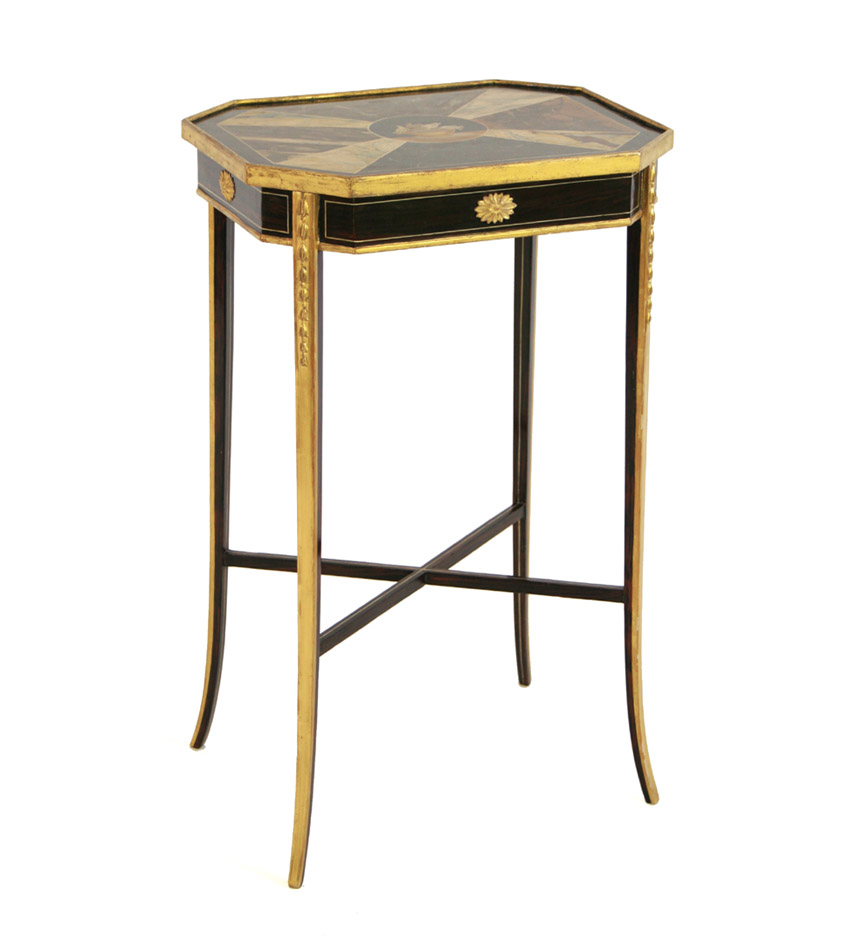 A Regency faux painted side table with octagonal faux marble top centering 