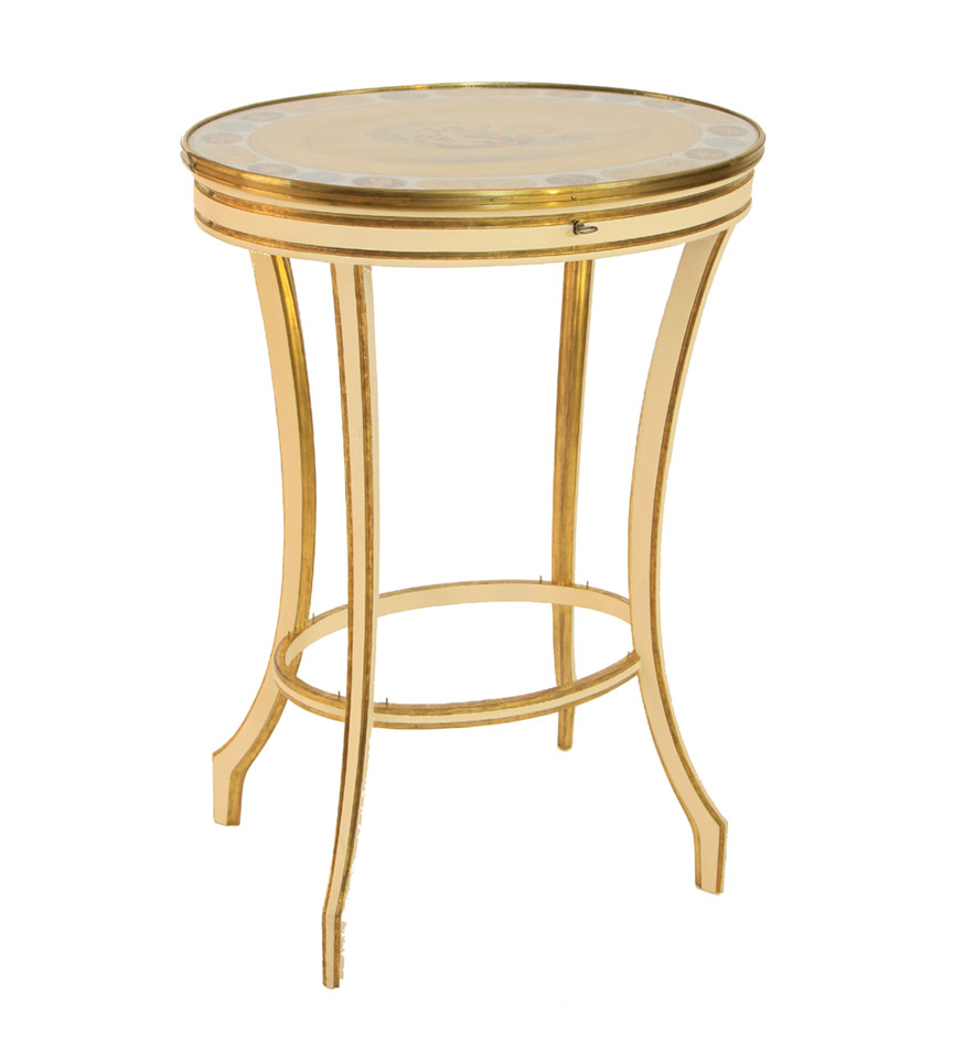 A George III Adams taste cream painted, gilt and decorated oval work table, the gouache decorated top depicting the goddess Venus.  Decoration refreshed.