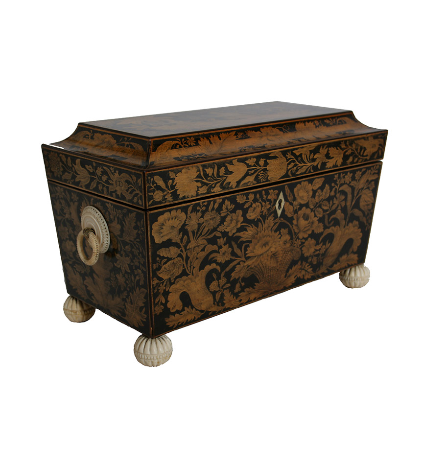 A large Regency  penwork tea caddy with oriental figural and floral decoration and ivory mounts, the interior decorated and fitted with a pair of caddies and a glass mixing bowl.