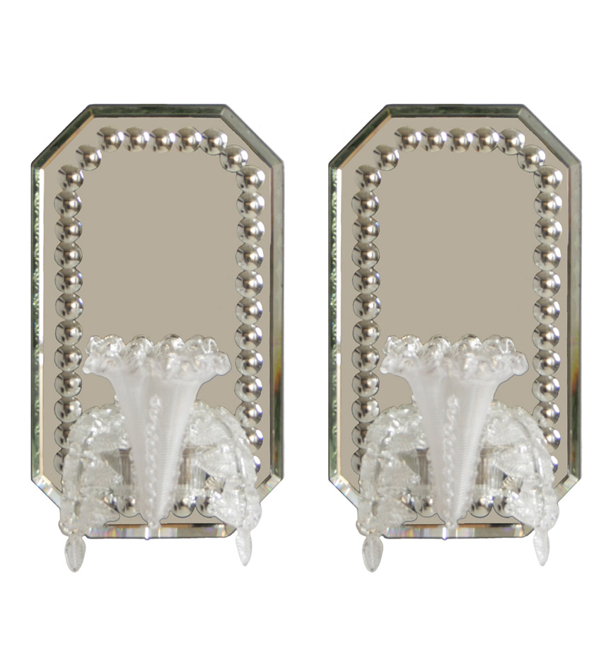  A pair of small notch-cornered mirrored wall appliques with swirl glass trumpet-flower vases with leaves.