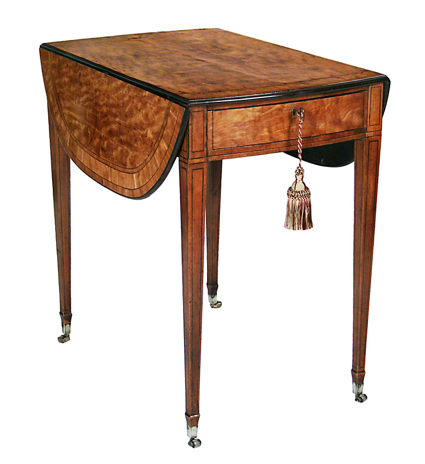 A George III finely figured satinwood pembroke table, with harewood crossbanding and inlays on tapering square legs.