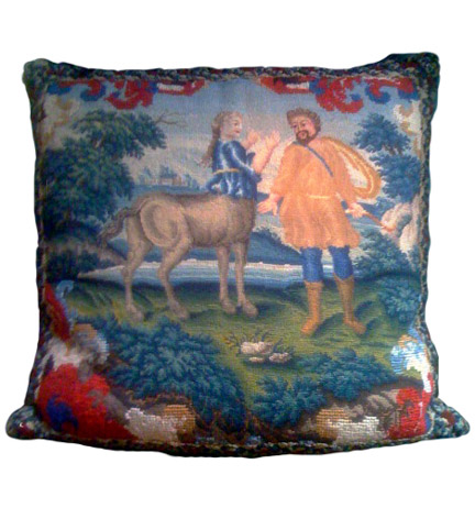 18th century petit point needlework cushion depicting a female centaur and her male companion, in a landscape.