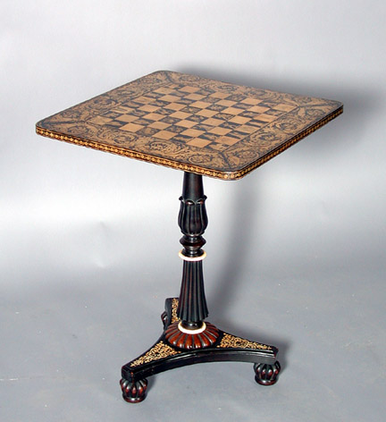 A good Anglo-Indian tilt-top penwork games table with finely decorated checkerboard top and ivory-inlaid ebony pedestal base in the manner of George Merrifield.

For a similar table, see p.328 of Christopher Gilbert's 'Pictorial Dictionary of Marked London Furniture', plate 626.