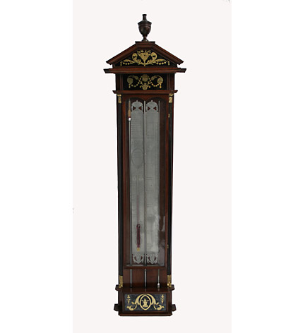 Dutch mahogany, ebonized and verre eglomise barometer with ebonized pilasters with brass capitals and pewter register plates, surmounted with an arched cornice with an urn finial.