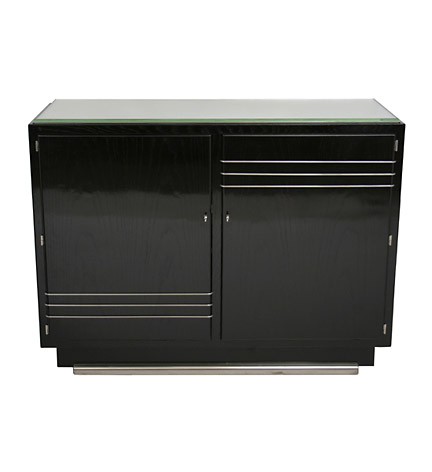 An extremely rare pair of French  Art Deco ebonized oak cabinets by Maurice Jallot with mirror tops and aluminum bases, the double doors decorated with three elegant metal lines on the upper and lower parts. the interiors fitted with drawers and open shelves.