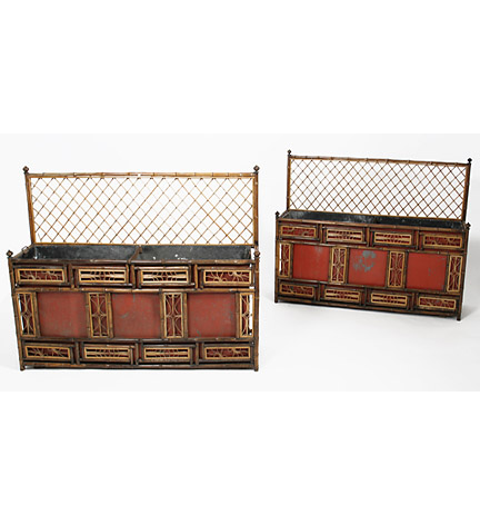 A rare pair of Regency Brighton Pavilion taste rattan jardinieres,  a bamboo trellis above red tole bodies overlaid with bamboo fretwork panels.