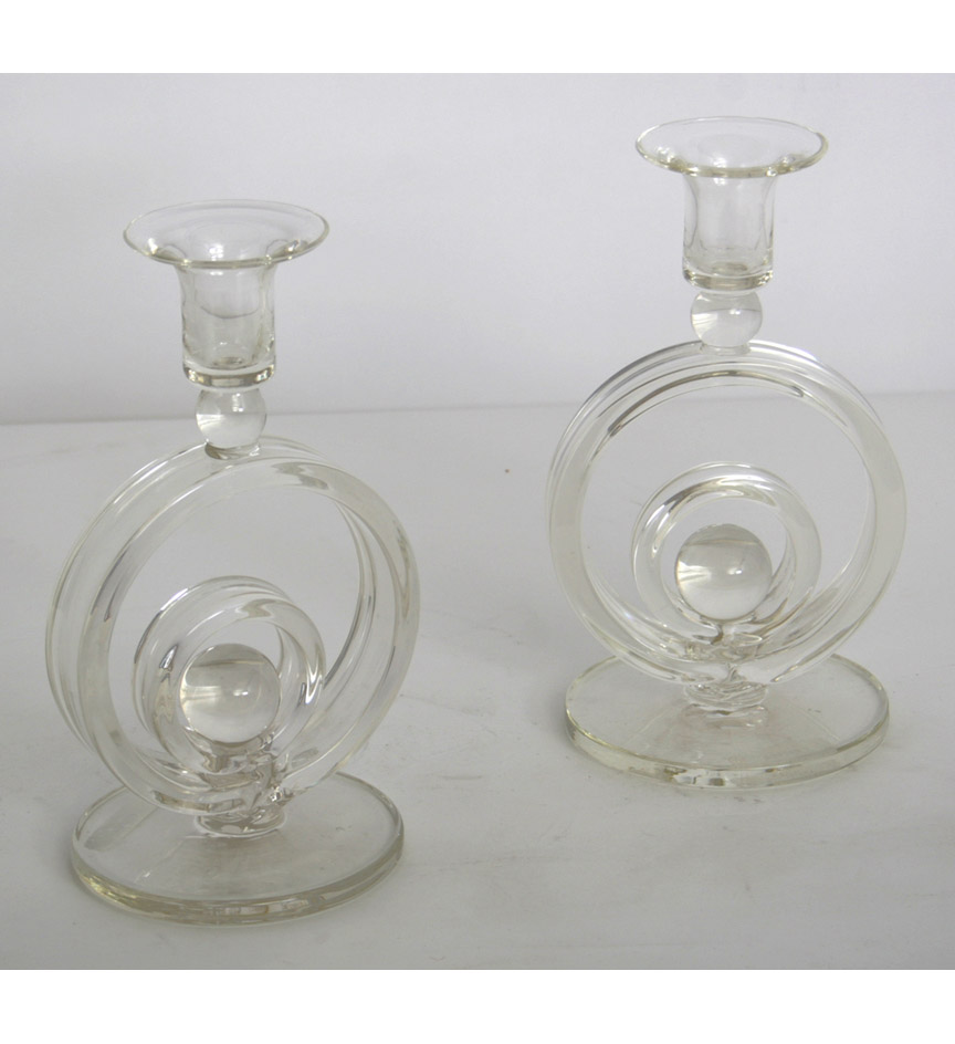 A pair of Art Deco hand blown crystal circular candlesticks, by Andries Dirk Copier, Leerdam.