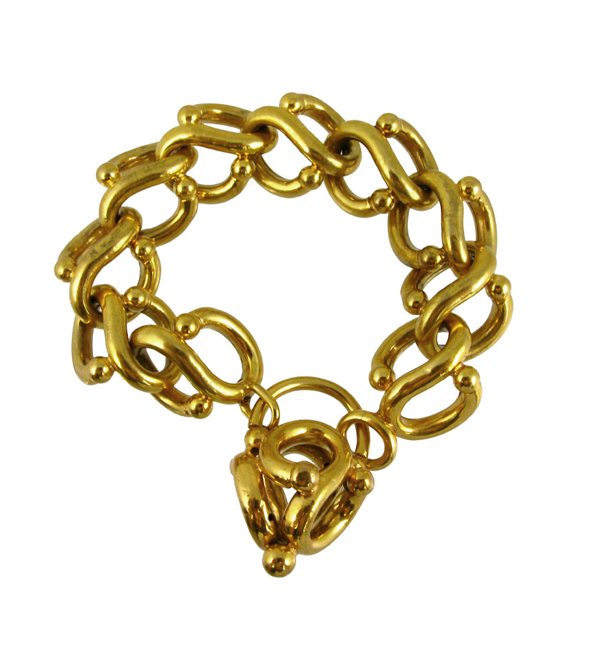 An antique open link gilt metal bracelet with a padlock clasp.